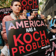 Activists hold a protest near the Manhattan apartment of billionaire and Republican financier David Koch on June 5, 2014 in New York City.